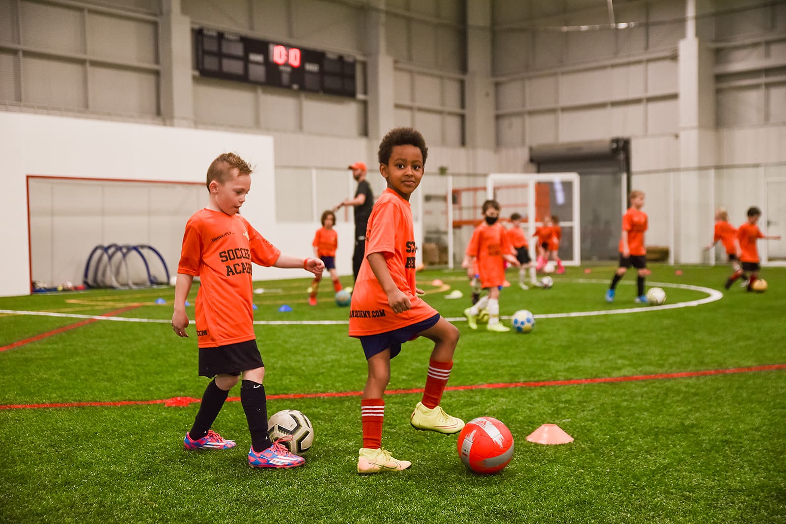 boys playing indoor soccer